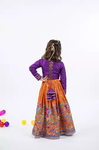 Elephant and peacock hand work purple full sleeve top with kalamkari embroidered orange lehenga