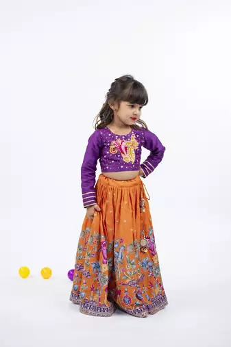 Elephant and peacock hand work purple full sleeve top with kalamkari embroidered orange lehenga