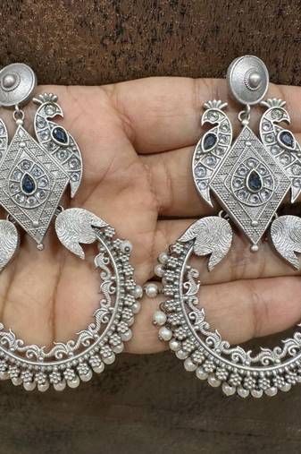 Silver peacock motif dangler earrings with blue stone silver replica half moon oxidised long antique partywear earrings