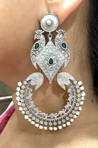 Silver peacock motif dangler earrings with blue stone silver replica half moon oxidised long antique partywear earrings