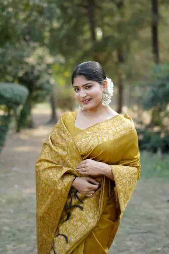 Yellow art silk blend weaving saree with woven fancy tassels 