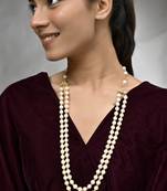 Double-strand pearl necklace with gold-toned clasps