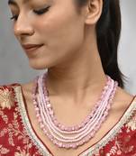Triple-strand pink beaded necklace