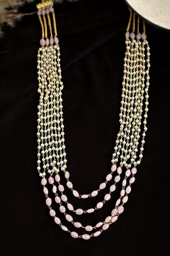 Multi-strand pearl and pink bead necklace
