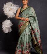 Dusty sea green art silk floral print golden zari border saree with unstitched blouse piece