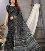 black ready to wear cotton blend batik block printed saree with unstiched blouse piece