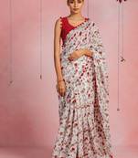 Off white cotton blend floral print pom pom lace border saree with unstitched blouse piece