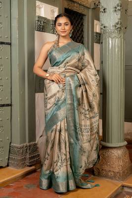 Beige silk blend floral print golden zari woven border saree with unstitched blouse piece 1