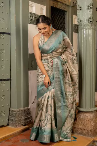 Beige silk blend floral print golden zari woven border saree with unstitched blouse piece