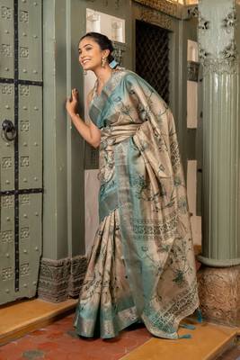 Beige silk blend floral print golden zari woven border saree with unstitched blouse piece 3