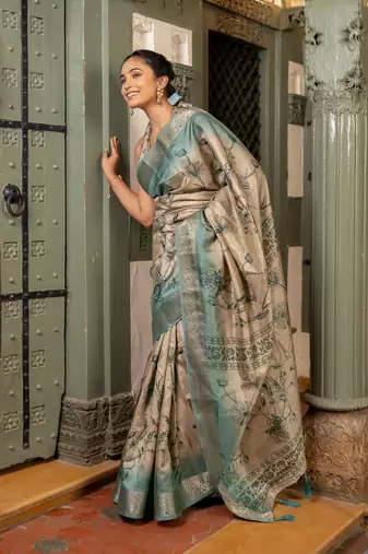 Beige silk blend floral print golden zari woven border saree with unstitched blouse piece