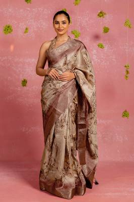 Beige silk blend floral print golden zari woven borde saree with unstitched blouse piece 1