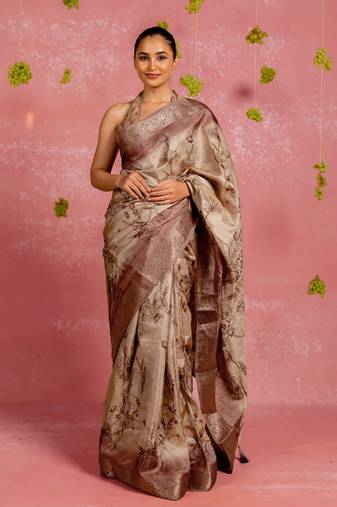Beige silk blend floral print golden zari woven borde saree with unstitched blouse piece