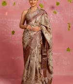 Beige silk blend floral print golden zari woven borde saree with unstitched blouse piece