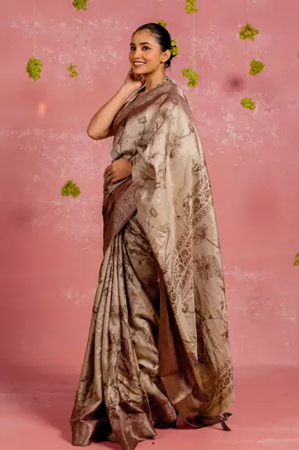 Beige silk blend floral print golden zari woven borde saree with unstitched blouse piece