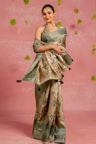 Beige silk blend floral print golden zari woven border tassels saree with unstitched blouse piece