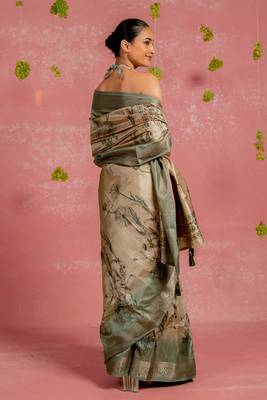 Beige silk blend floral print golden zari woven border tassels saree with unstitched blouse piece 4