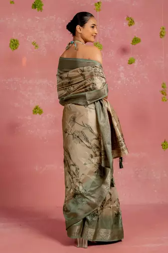 Beige silk blend floral print golden zari woven border tassels saree with unstitched blouse piece