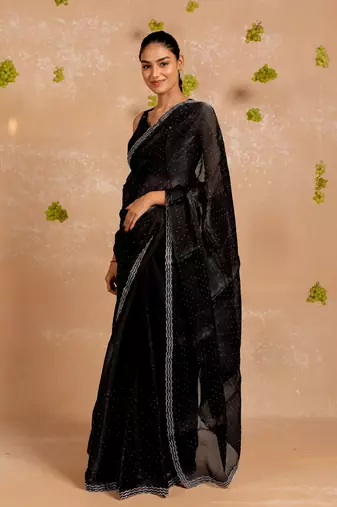 Sea green organza embroidered golden zari woven border saree with unstitched blouse piece