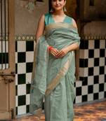 Sea green organza embroidered golden zari woven border saree with unstitched blouse piece