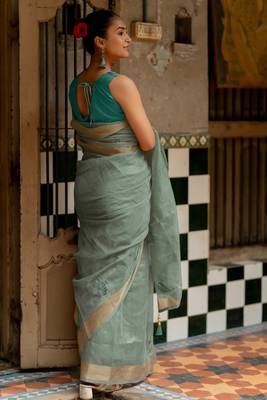 Sea green organza embroidered golden zari woven border saree with unstitched blouse piece 4