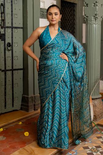 Rama blue chiffon foil chevron print ethnic motif sequins lace border saree with unstiched blouse piece