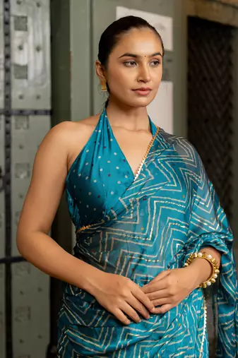 Rama blue chiffon foil chevron print ethnic motif sequins lace border saree with unstiched blouse piece