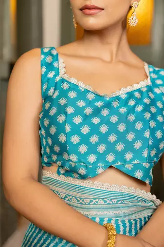 Turquoise blue chiffon stripes leheriya print zari work lace border saree with unstiched blouse piece