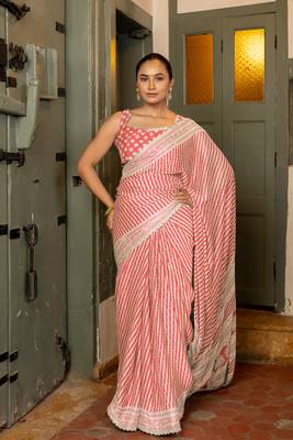 Dark peach chiffon stripes leheriya print zari work lace border saree with unstiched blouse piece 1
