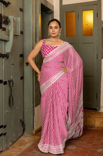 Rani pink chiffon stripes leheriya print zari work lace border saree with unstiched blouse piece