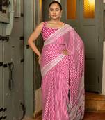 Rani pink chiffon stripes leheriya print zari work lace border saree with unstiched blouse piece
