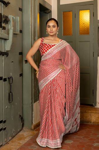 Red chiffon stripes leheriya print zari work lace border saree with unstiched blouse piece