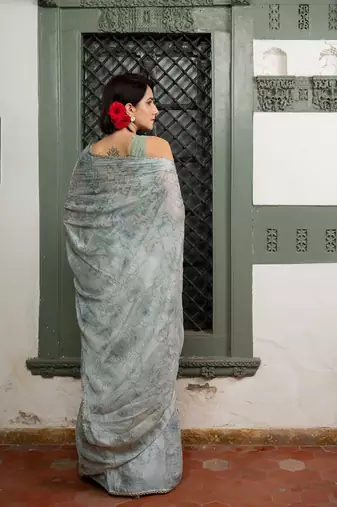 Light dusty blue chiffon foil floral print lace border saree with unstiched blouse piece