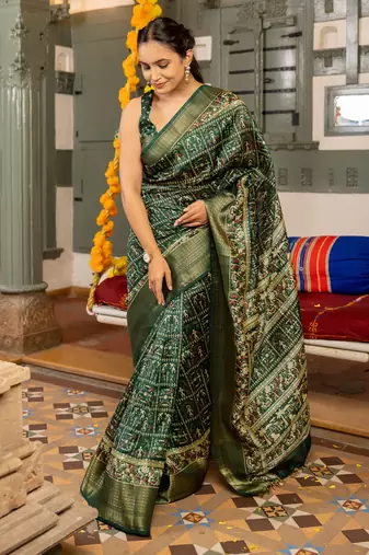 Red art silk ajrakh print golden zari saree with unstiched blouse piece