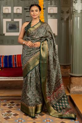 Dark green art silk ajrakh print golden zari saree with unstiched blouse piece 1