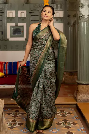 Dark green art silk ajrakh print golden zari saree with unstiched blouse piece