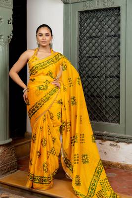Dark yellow chiffon batik block print lace border saree with unstiched blouse piece 1