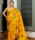 Dark yellow chiffon batik block print lace border saree with unstiched blouse piece
