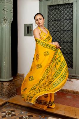 Dark yellow chiffon batik block print lace border saree with unstiched blouse piece 3