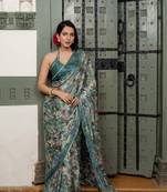 Dark turquoise blue chiffon floral print lace border saree with unstiched blouse piece