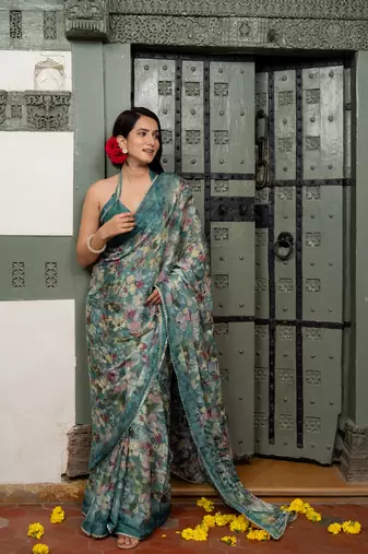 Dark turquoise blue chiffon floral print lace border saree with unstiched blouse piece