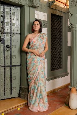 Light peach chiffon floral print lace border saree with unstiched blouse piece 1