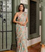 Light peach chiffon floral print lace border saree with unstiched blouse piece