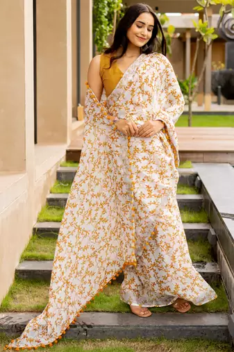 White cotton blend leaf print pom pom lace border saree with unstiched blouse piece