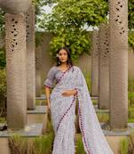 White cotton blend leaf print pom pom lace border saree with unstiched blouse piece