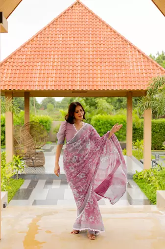 Light pink cotton blend floral print crochet lace saree with unstiched blouse piece