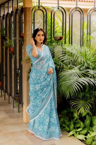 Dusty turquoise cotton blend floral print crochet lace saree with unstiched blouse piece