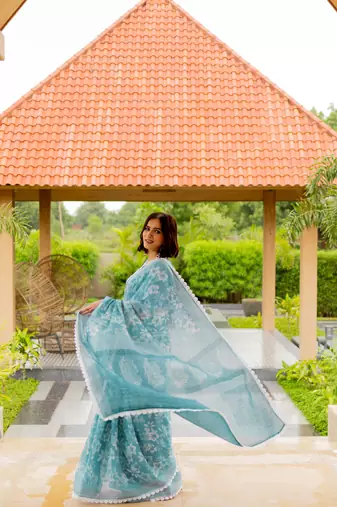 Dusty turquoise cotton blend floral print crochet lace saree with unstiched blouse piece