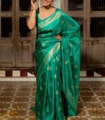 Green silk blend foil print woven design saree with unstiched blouse piece