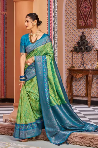 Green Banarasi Style Soft Silk blend Zari Border & Threads work Saree With Blouse